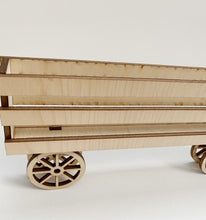 Interchangeable Inserts with Banners for Raised Shelf Sitters and Wagons