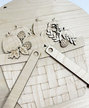 Interchangeable Bases and Door Hangers for Seasonal Basket Inserts and Add Ons