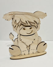 Highland Cow Standing Shelf Sitter with Interchangeable Seasonal Hats