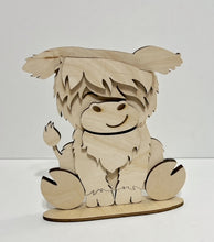Highland Cow Standing Shelf Sitter with Interchangeable Seasonal Hats