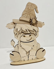 Highland Cow Standing Shelf Sitter with Interchangeable Seasonal Hats