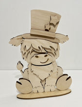 Highland Cow Standing Shelf Sitter with Interchangeable Seasonal Hats