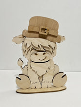 Highland Cow Standing Shelf Sitter with Interchangeable Seasonal Hats