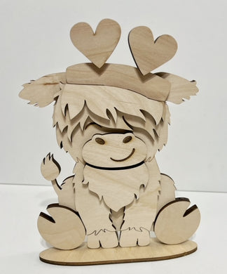 Highland Cow Standing Shelf Sitter with Interchangeable Seasonal Hats