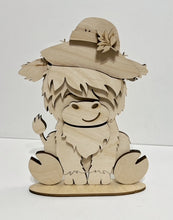 Highland Cow Standing Shelf Sitter with Interchangeable Seasonal Hats