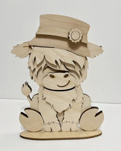 Highland Cow Standing Shelf Sitter with Interchangeable Seasonal Hats