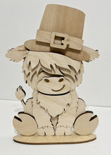 Highland Cow Standing Shelf Sitter with Interchangeable Seasonal Hats