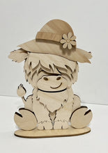 Highland Cow Standing Shelf Sitter with Interchangeable Seasonal Hats