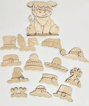 Highland Cow Standing Shelf Sitter with Interchangeable Seasonal Hats