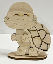 Happy Turtle Standing Shelf Sitter with Interchangeable Seasonal Hats