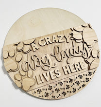 A Crazy Dog Lady Lives Here Round Doorhanger
