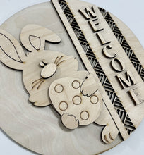 Welcome Easter Bunny with Egg Peaking Geometric Border Round Doorhanger 10"