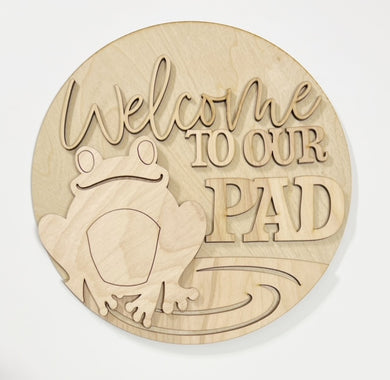 Cute Frog Welcome To Our Pad Round Doorhanger