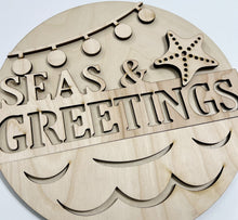 Seas & Greetings Christmas Beach Round Doorhanger 12"