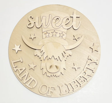 Sweet Land of Liberty Cow Round Doorhanger