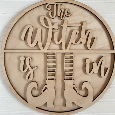The Witch Is In Round Doorhanger