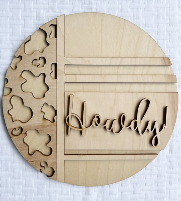 Howdy! Cow Print Round Doorhanger – Sawdust & Swirls
